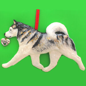 Hand-painted break-resistant acrylic resin dog Christmas ornament featuring a full-body Alaskan Malamute in a gaiting pose, designed to hang on a tree or stand for display.