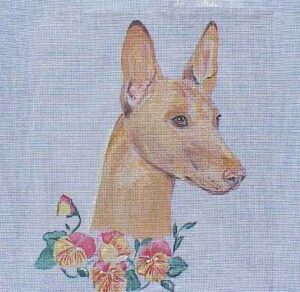 Pharaoh Hound Needlepoint Kit. Traditional true-to-life Pharaoh Hound image with flowers at neckline, painted with permanent acrylic paint onto Zweigart 14 ct. orange line, all cotton, interlocking canvas. Perfect to make a pillow, handbag, quilt center, or wall-hanging.