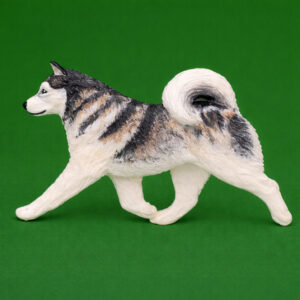 Hand-painted break-resistant acrylic resin dog magnet featuring a full-body Alaskan-Malamute in a gaiting pose, designed to attach to metal surfaces.