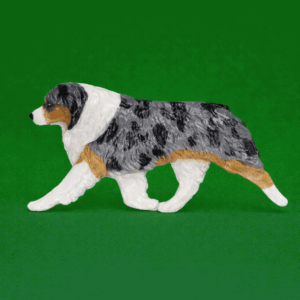 Hand-painted break-resistant acrylic resin dog magnet featuring a full-body Australian Shepherd Blue Merle in a gaiting pose, designed to attach to metal surfaces.