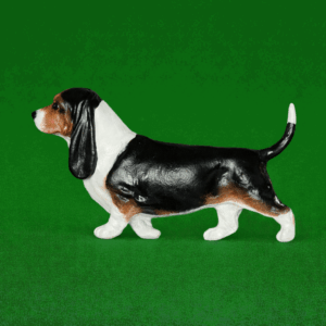 Hand-painted break-resistant acrylic resin dog magnet featuring a full-body Basset Hound Black in a gaiting pose, designed to attach to metal surfaces.