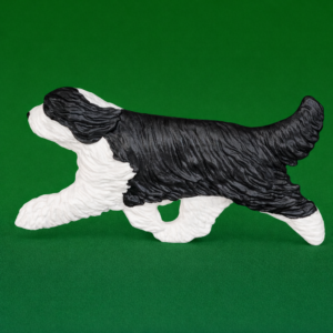 Hand-painted break-resistant acrylic resin dog magnet featuring a full-body Bearded Collie in a gaiting pose, designed to attach to metal surfaces.