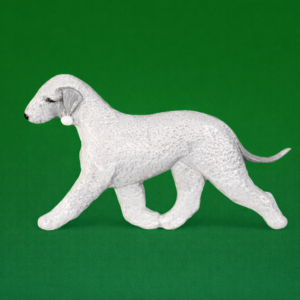 Hand-painted break-resistant acrylic resin dog magnet featuring a full-body Bedlington Terrier Blue in a gaiting pose, designed to attach to metal surfaces.