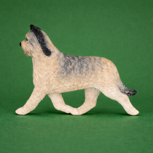 Hand-painted break-resistant acrylic resin dog magnet featuring a full-body Briard-Tawny in a gaiting pose, designed to attach to metal surfaces.