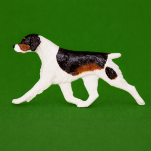 Hand-painted break-resistant acrylic resin dog magnet featuring a full-body Brittany-Tri-Colored in a gaiting pose, designed to attach to metal surfaces.