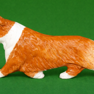 Hand-painted break-resistant acrylic resin dog magnet featuring a full-body Corgi-welsh-cardigan Red and White in a gaiting pose, designed to attach to metal surfaces.