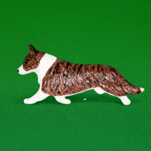 Hand-painted break-resistant acrylic resin dog magnet featuring a full-body Corgi-welsh-cardigan in a gaiting pose, designed to attach to metal surfaces.
