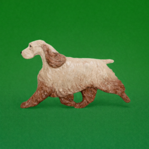 Hand-painted break-resistant acrylic resin dog magnet featuring a full-body English Cocker-Spaniel Ascob- in a gaiting pose, designed to attach to metal surfaces.