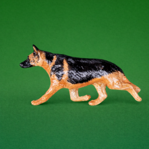 Hand-painted break-resistant acrylic resin dog magnet featuring a full-body German-Shepherd-Dog in a gaiting pose, designed to attach to metal surfaces.