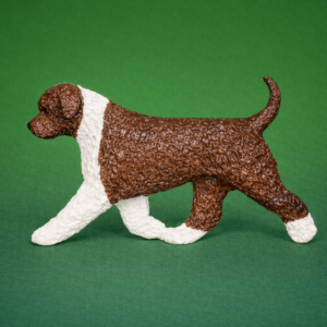 Lagotto Romagnolo brown and white magnet with dog gaiting facing left. Hand painted magnet with highly durable surface for refrigerator or other metal or magnetic surfaces. Two magnets are inserted flush on the back of magnet.